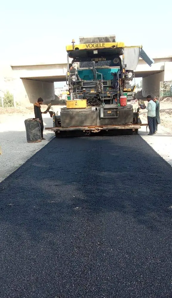 Vogele paver machine laying asphalt